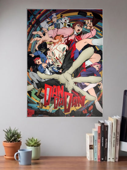 Dandadan Cast Reaching Out Anime Poster shown in A3 size on a wall above a study desk