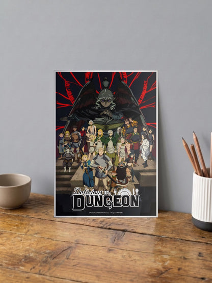 Delicious In Dungeon Key Visual Anime Poster shown in A4 size on a wooden desk