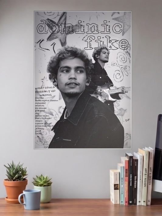 Dominic Fike Song Collage Singers Poster shown in A3 size on a wall above a study desk
