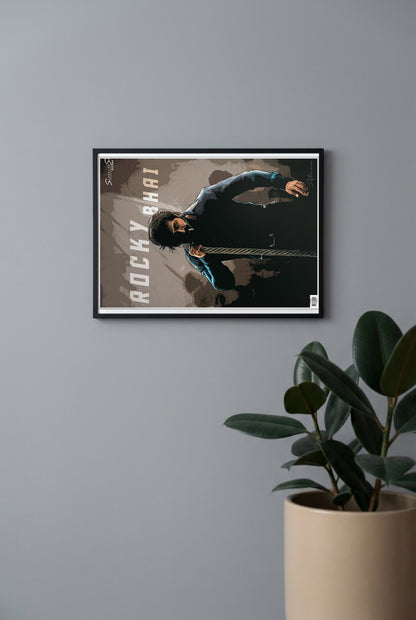 Kgf Rocky Bhai Sandalwood Movie Poster in a black frame, mounted on a wall