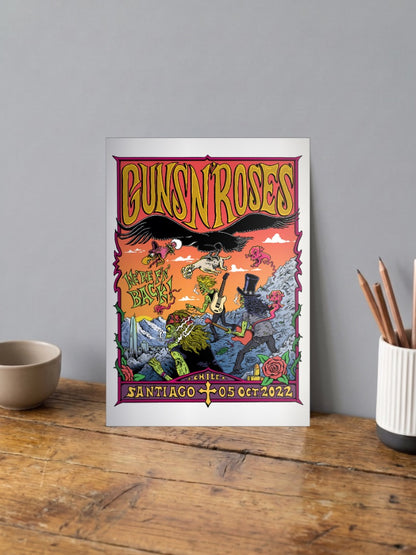 Guns N Roses Were Back Poster Bands Poster shown in A4 size on a wooden desk