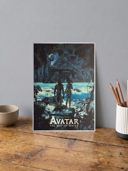 Avatar Way Of Water Poster Hollywood Movie Poster shown in A4 size on a wooden desk