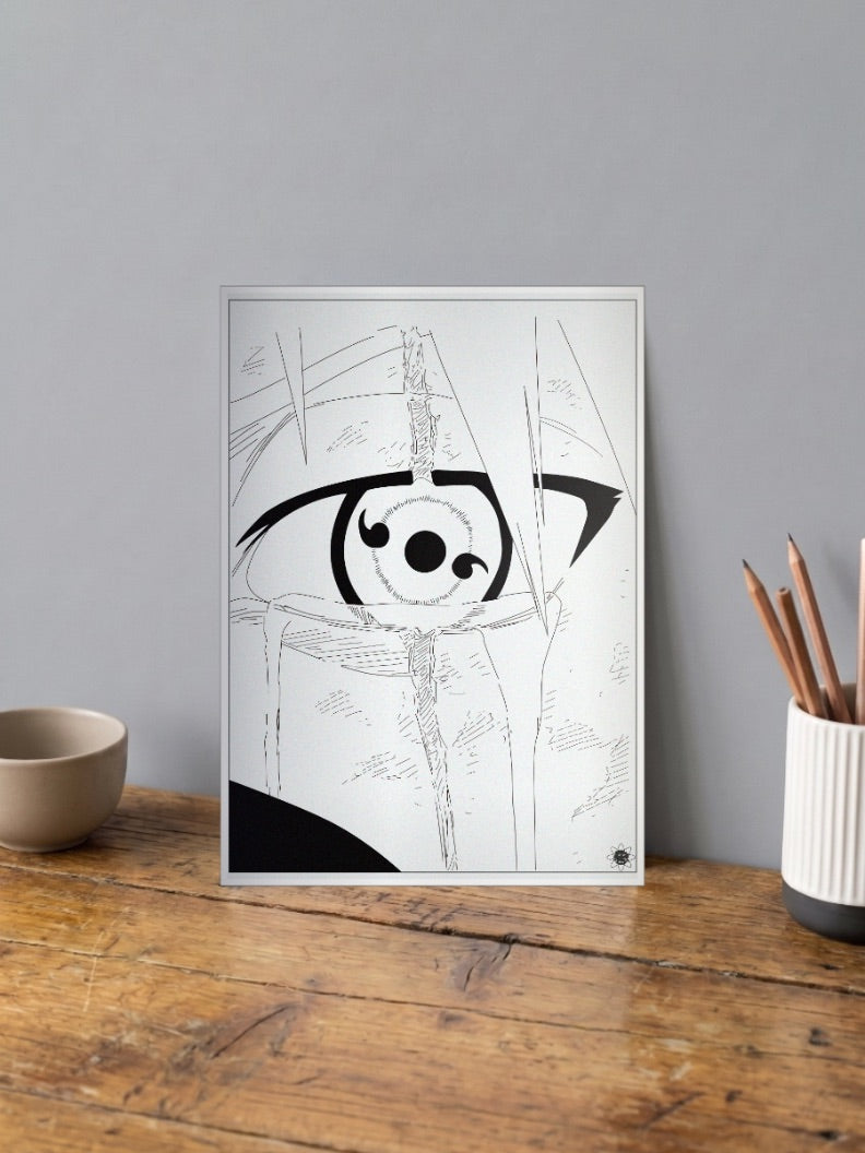 Sharingan Eye Line Art Anime Poster shown in A4 size on a wooden desk