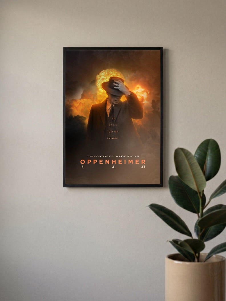 Oppenheimer World Changes Hollywood Movie Poster in a black frame, mounted on a wall