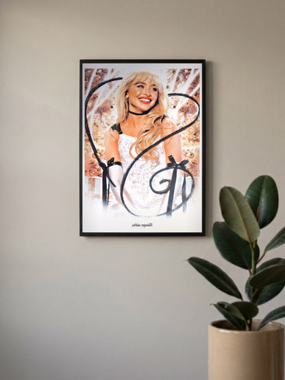 Sabrina Carpenter Glam Portrait Singers Poster in a black frame, mounted on a wall