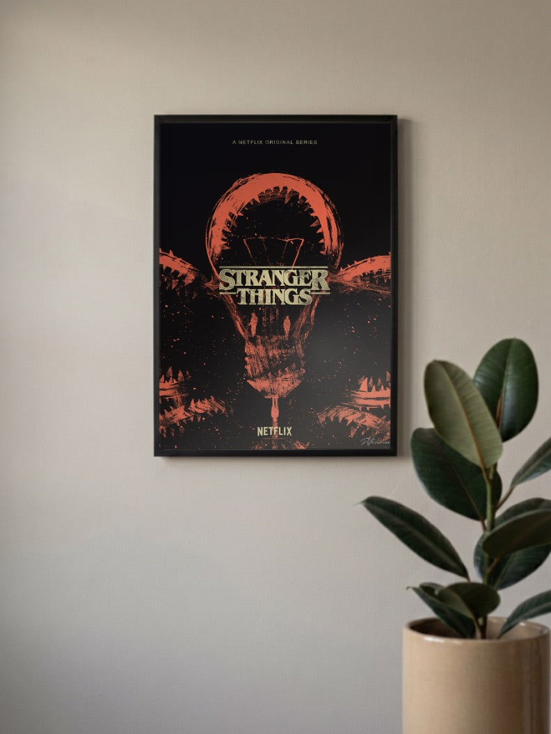 Stranger Things Demogorgon Jaw Netflix Poster in a black frame, mounted on a wall