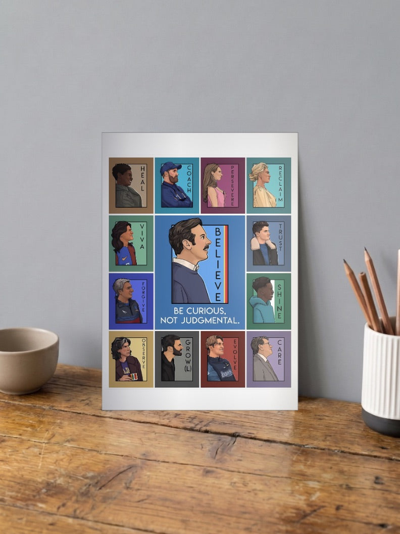 Ted Lasso Cast Grid Sitcom Poster shown in A4 size on a wooden desk