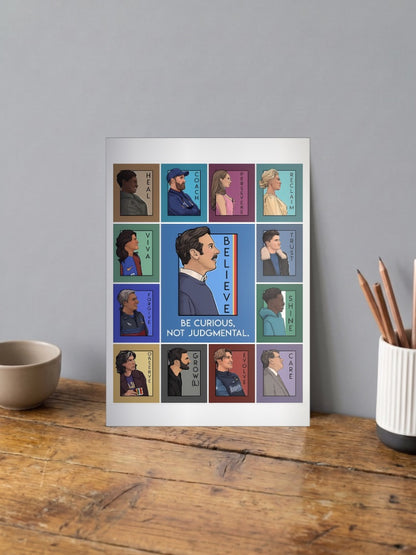 Ted Lasso Cast Grid Sitcom Poster shown in A4 size on a wooden desk