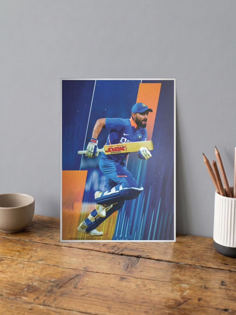 Virat Kohli Running Cricket Poster shown in A4 size on a wooden desk